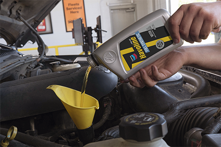 Become a professional Havoline installer Pouring Havoline ProDS into engine