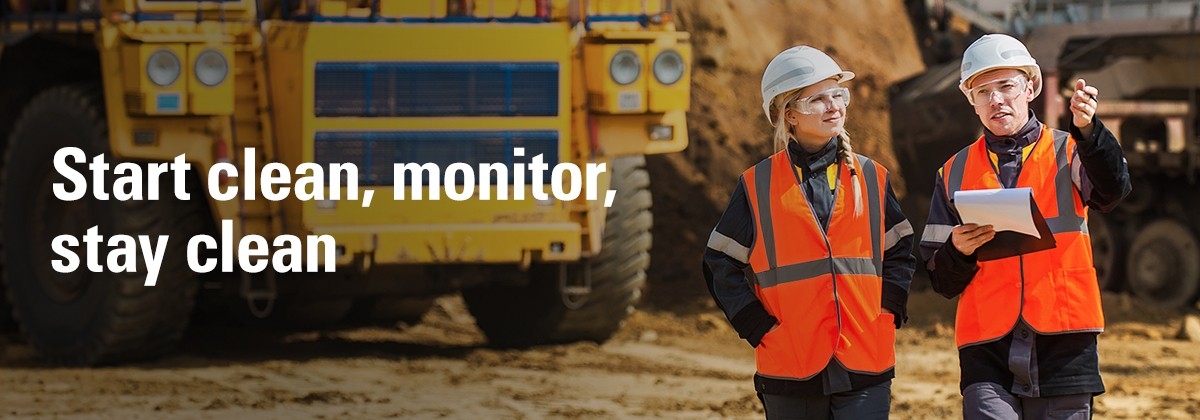 Start clean, monitor, stay clean 2 people inspecting construction site