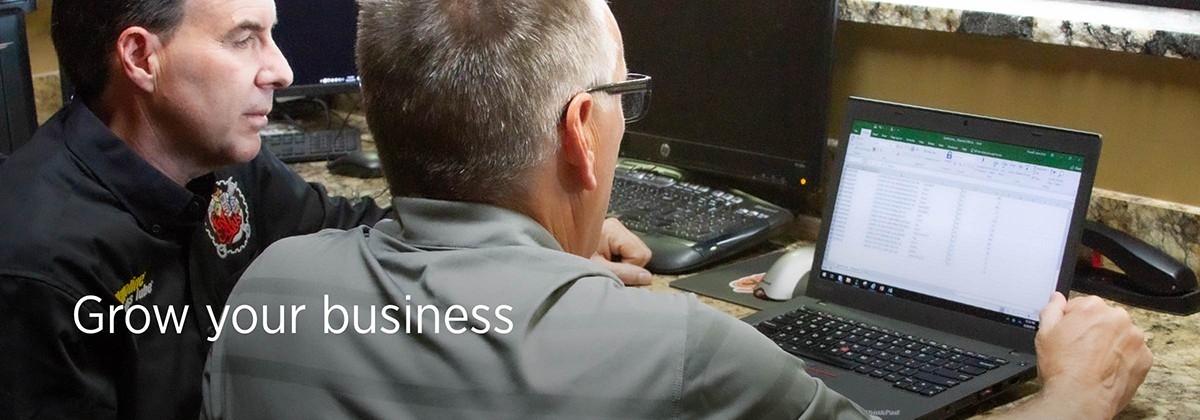 Grow your business Men on computer