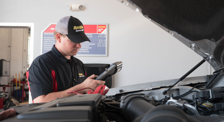 Mechanic checking electronics