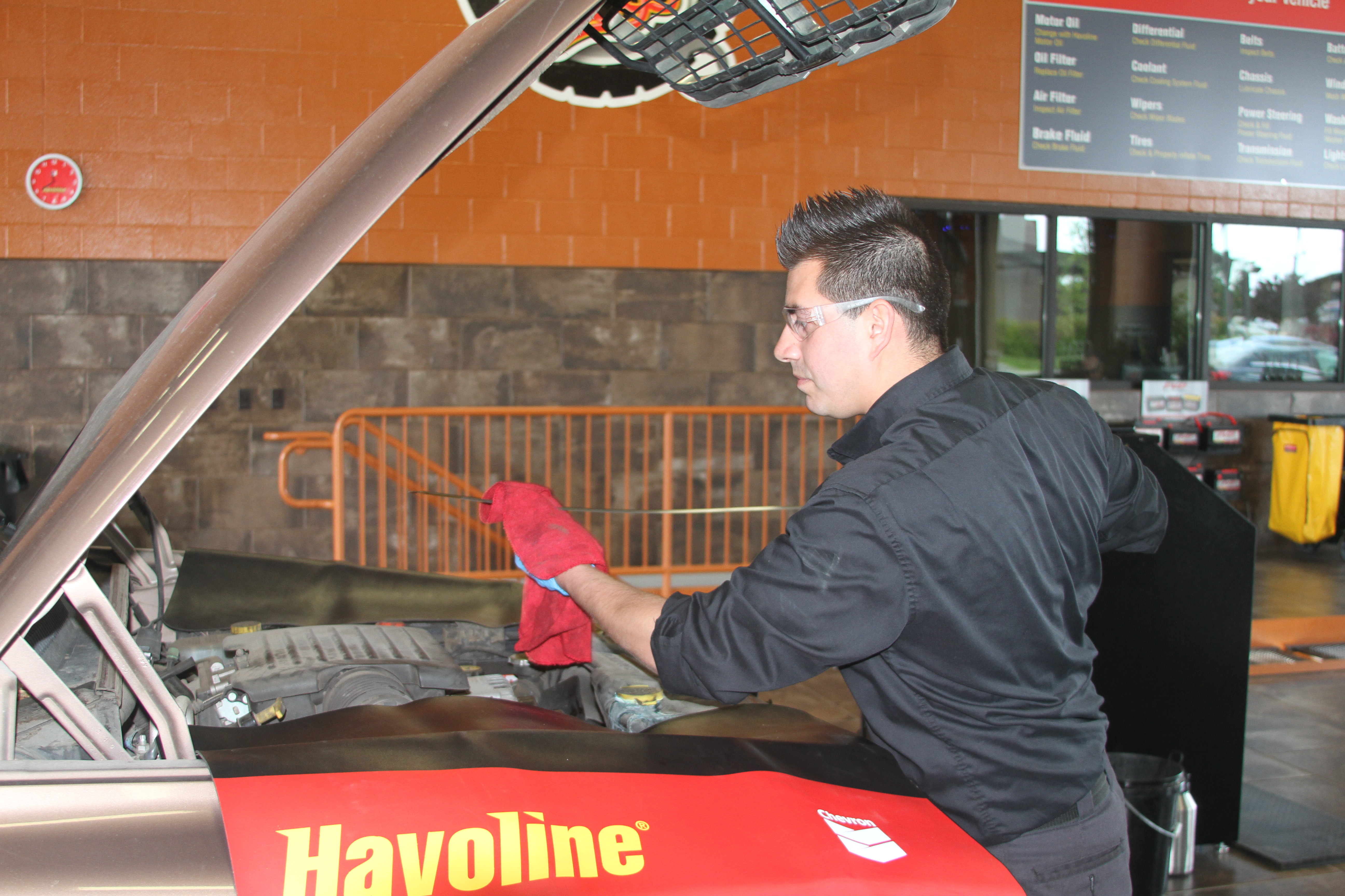 man working on car man working on car